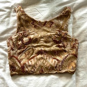 A very nice and elegant sequenced top! Perfect for a night out!